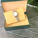 Women Rolex Watch (gold and silver colour)